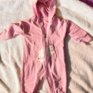 Nike baby romper with a cozy hood